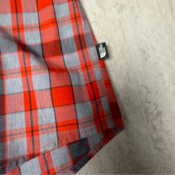 The North Face Orange and Gray Plaid Shirt snaps - Picture 2 of 6